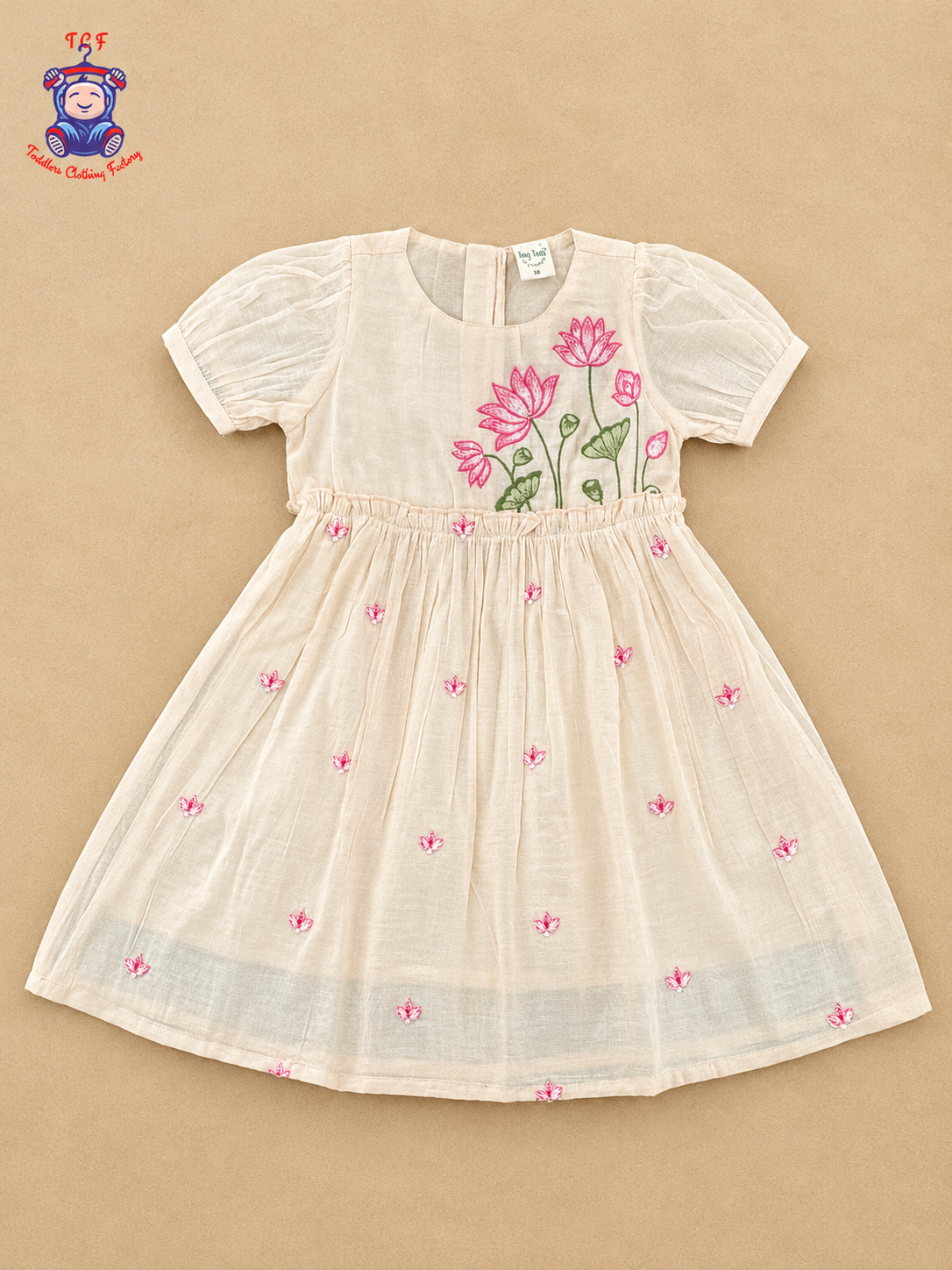Girls Peach Beige Floral Embroidered Frock with Pink Lotus Design