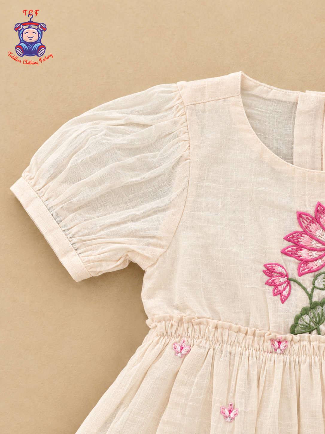 Girls Peach Beige Floral Embroidered Frock with Pink Lotus Design