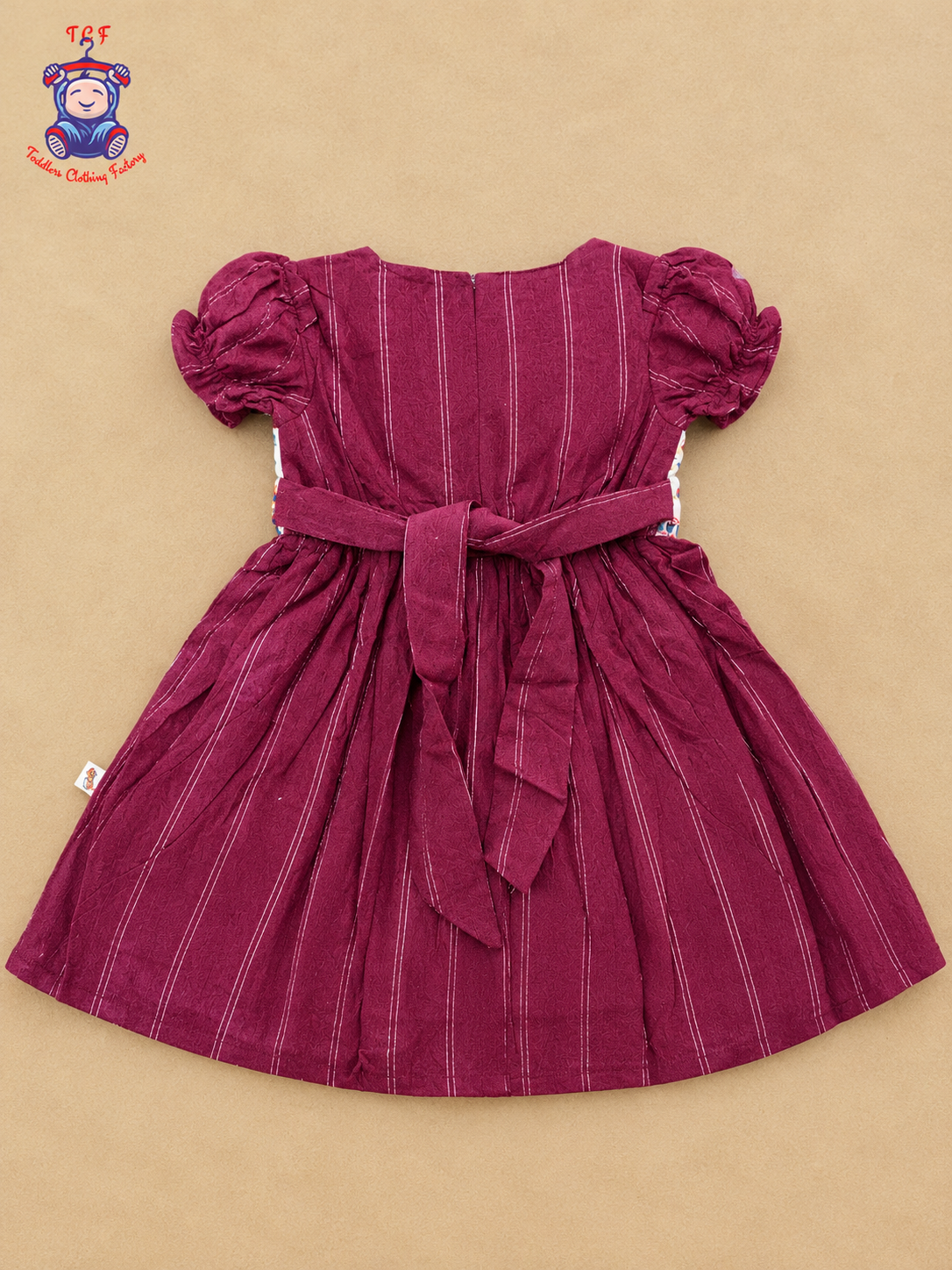Girls Maroon & Cream Floral Embroidered Frock with Lace-Up Tassel Detail